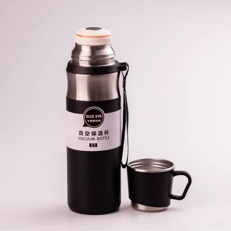 Зображення товару Термос Vacuum cup із нержавійки 600 мл із чашкою та ремінцем тримас тепло до 12 годин HPGM80155B2